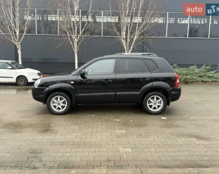 Черный Хендай Туксон, объемом двигателя 2 л и пробегом 237 тыс. км за 8350 $, фото 8 на Automoto.ua