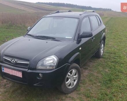 Черный Хендай Туксон, объемом двигателя 2 л и пробегом 198 тыс. км за 8200 $, фото 2 на Automoto.ua