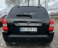 Чорний Хендай Туксон, об'ємом двигуна 2 л та пробігом 166 тис. км за 7500 $, фото 4 на Automoto.ua
