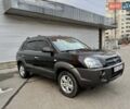 Черный Хендай Туксон, объемом двигателя 2 л и пробегом 282 тыс. км за 8700 $, фото 1 на Automoto.ua