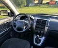 Черный Хендай Туксон, объемом двигателя 2 л и пробегом 198 тыс. км за 8200 $, фото 15 на Automoto.ua