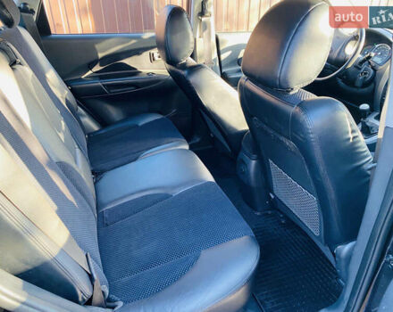 Черный Хендай Туксон, объемом двигателя 1.99 л и пробегом 95 тыс. км за 8500 $, фото 17 на Automoto.ua