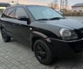 Черный Хендай Туксон, объемом двигателя 2 л и пробегом 198 тыс. км за 7999 $, фото 1 на Automoto.ua