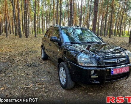 Черный Хендай Туксон, объемом двигателя 2 л и пробегом 204 тыс. км за 8900 $, фото 1 на Automoto.ua