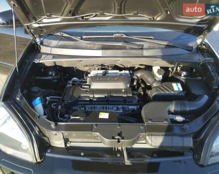 Черный Хендай Туксон, объемом двигателя 1.99 л и пробегом 159 тыс. км за 9700 $, фото 10 на Automoto.ua