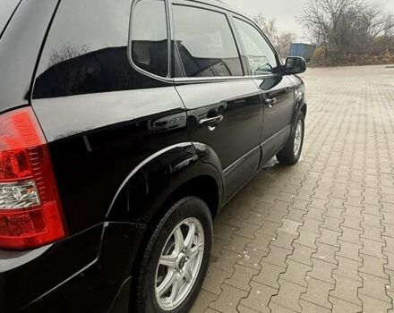 Черный Хендай Туксон, объемом двигателя 2 л и пробегом 237 тыс. км за 8350 $, фото 10 на Automoto.ua