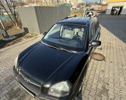 Черный Хендай Туксон, объемом двигателя 1.98 л и пробегом 220 тыс. км за 7500 $, фото 4 на Automoto.ua