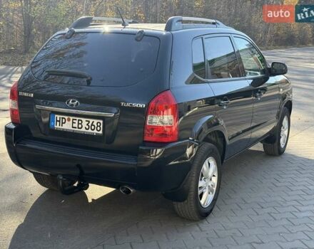 Черный Хендай Туксон, объемом двигателя 2 л и пробегом 148 тыс. км за 8700 $, фото 38 на Automoto.ua