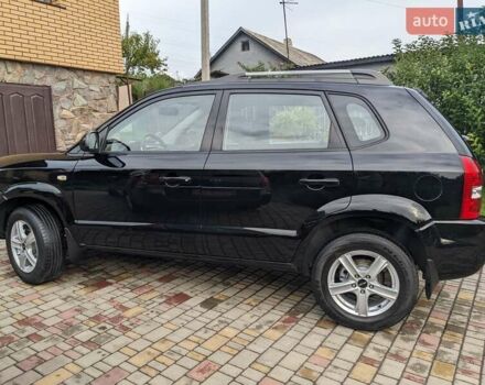 Чорний Хендай Туксон, об'ємом двигуна 2 л та пробігом 217 тис. км за 7700 $, фото 9 на Automoto.ua