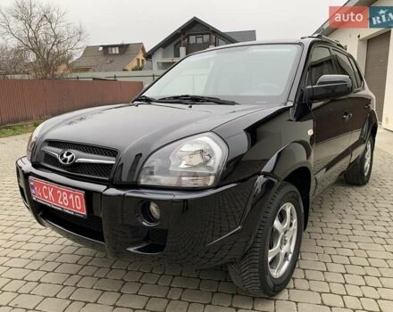Черный Хендай Туксон, объемом двигателя 2 л и пробегом 114 тыс. км за 8850 $, фото 1 на Automoto.ua