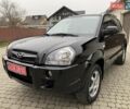 Черный Хендай Туксон, объемом двигателя 2 л и пробегом 114 тыс. км за 8850 $, фото 1 на Automoto.ua