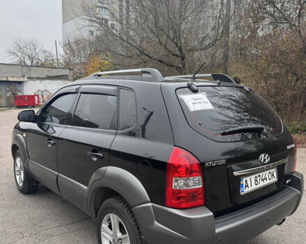 Черный Хендай Туксон, объемом двигателя 1.98 л и пробегом 120 тыс. км за 8500 $, фото 5 на Automoto.ua