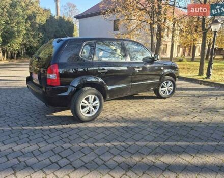 Чорний Хендай Туксон, об'ємом двигуна 2 л та пробігом 187 тис. км за 7900 $, фото 2 на Automoto.ua