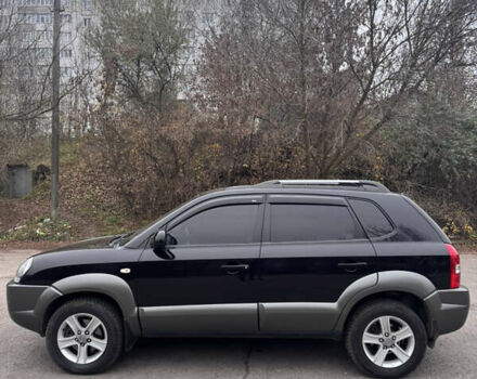 Черный Хендай Туксон, объемом двигателя 1.98 л и пробегом 120 тыс. км за 8500 $, фото 6 на Automoto.ua