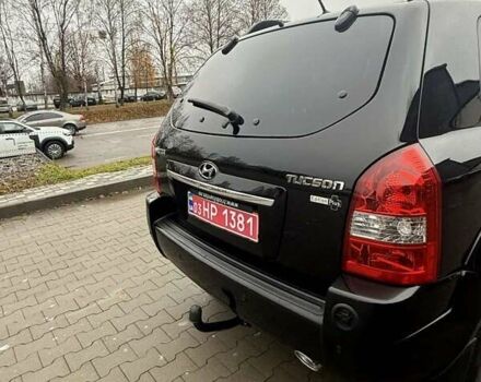 Черный Хендай Туксон, объемом двигателя 2 л и пробегом 237 тыс. км за 8350 $, фото 9 на Automoto.ua