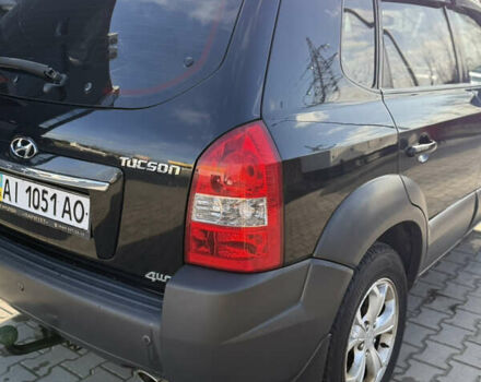 Черный Хендай Туксон, объемом двигателя 1.98 л и пробегом 220 тыс. км за 7500 $, фото 12 на Automoto.ua