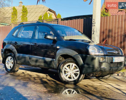 Черный Хендай Туксон, объемом двигателя 1.99 л и пробегом 95 тыс. км за 8700 $, фото 33 на Automoto.ua