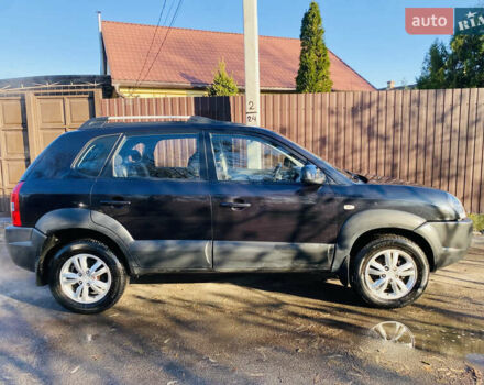 Черный Хендай Туксон, объемом двигателя 1.99 л и пробегом 95 тыс. км за 8500 $, фото 14 на Automoto.ua