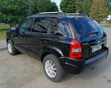 Чорний Хендай Туксон, об'ємом двигуна 1.98 л та пробігом 242 тис. км за 8900 $, фото 2 на Automoto.ua