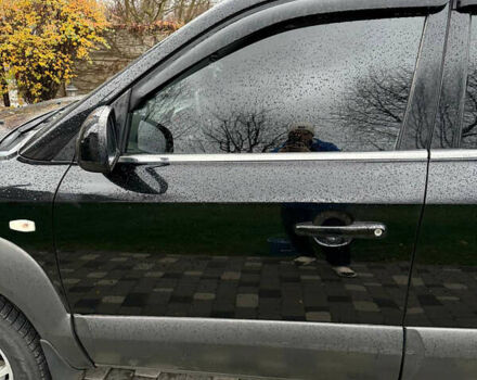 Черный Хендай Туксон, объемом двигателя 2.66 л и пробегом 205 тыс. км за 10000 $, фото 16 на Automoto.ua