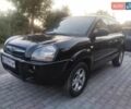 Черный Хендай Туксон, объемом двигателя 2 л и пробегом 271 тыс. км за 7777 $, фото 1 на Automoto.ua