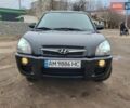 Черный Хендай Туксон, объемом двигателя 2 л и пробегом 194 тыс. км за 9100 $, фото 1 на Automoto.ua