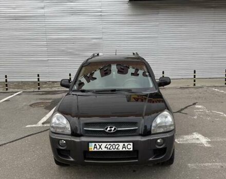 Черный Хендай Туксон, объемом двигателя 2 л и пробегом 282 тыс. км за 8700 $, фото 20 на Automoto.ua