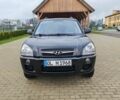 Чорний Хендай Туксон, об'ємом двигуна 1.98 л та пробігом 148 тис. км за 6199 $, фото 1 на Automoto.ua