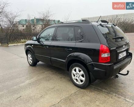 Черный Хендай Туксон, объемом двигателя 2 л и пробегом 128 тыс. км за 9200 $, фото 4 на Automoto.ua