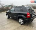 Черный Хендай Туксон, объемом двигателя 2 л и пробегом 128 тыс. км за 9200 $, фото 4 на Automoto.ua