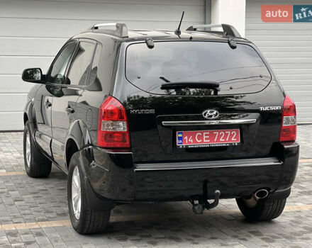 Чорний Хендай Туксон, об'ємом двигуна 2 л та пробігом 163 тис. км за 9199 $, фото 5 на Automoto.ua