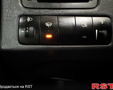 Черный Хендай Туксон, объемом двигателя 2 л и пробегом 160 тыс. км за 8800 $, фото 8 на Automoto.ua