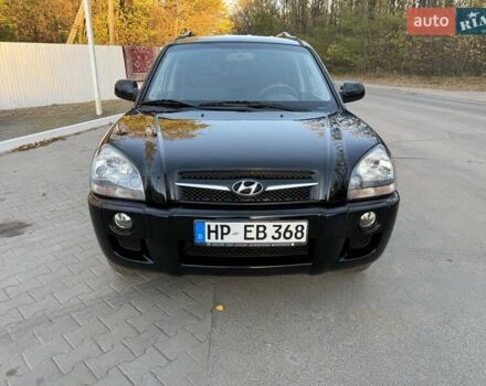 Черный Хендай Туксон, объемом двигателя 2 л и пробегом 148 тыс. км за 8700 $, фото 8 на Automoto.ua