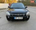 Черный Хендай Туксон, объемом двигателя 2 л и пробегом 148 тыс. км за 8700 $, фото 8 на Automoto.ua