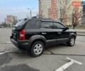Черный Хендай Туксон, объемом двигателя 2 л и пробегом 282 тыс. км за 8700 $, фото 4 на Automoto.ua