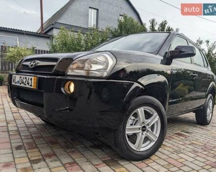 Чорний Хендай Туксон, об'ємом двигуна 2 л та пробігом 217 тис. км за 7700 $, фото 5 на Automoto.ua