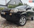 Чорний Хендай Туксон, об'ємом двигуна 2 л та пробігом 217 тис. км за 7700 $, фото 5 на Automoto.ua