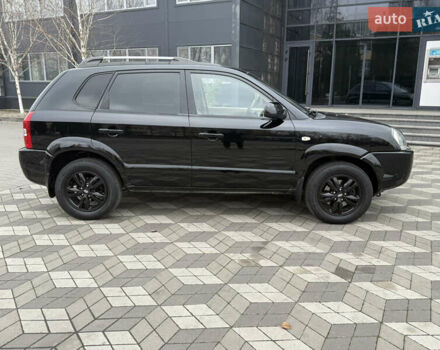 Черный Хендай Туксон, объемом двигателя 2 л и пробегом 191 тыс. км за 8500 $, фото 12 на Automoto.ua