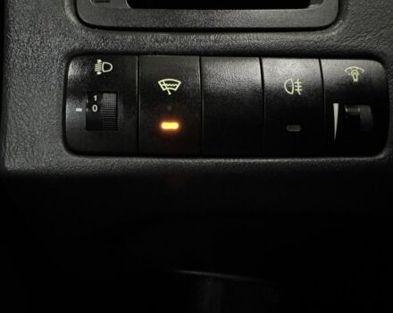 Черный Хендай Туксон, объемом двигателя 2 л и пробегом 160 тыс. км за 8300 $, фото 12 на Automoto.ua