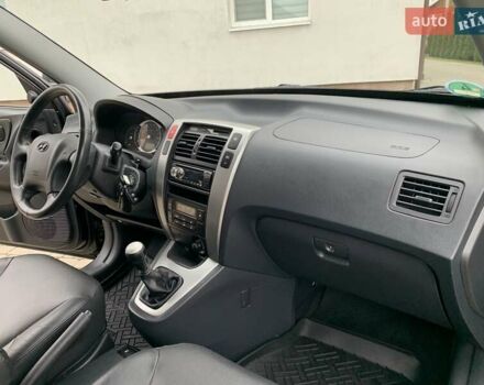 Черный Хендай Туксон, объемом двигателя 2 л и пробегом 114 тыс. км за 8850 $, фото 53 на Automoto.ua