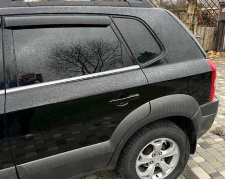 Черный Хендай Туксон, объемом двигателя 2.66 л и пробегом 205 тыс. км за 10000 $, фото 29 на Automoto.ua