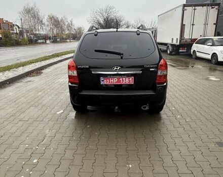 Черный Хендай Туксон, объемом двигателя 2 л и пробегом 237 тыс. км за 8350 $, фото 6 на Automoto.ua