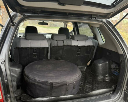 Черный Хендай Туксон, объемом двигателя 1.98 л и пробегом 220 тыс. км за 7500 $, фото 20 на Automoto.ua