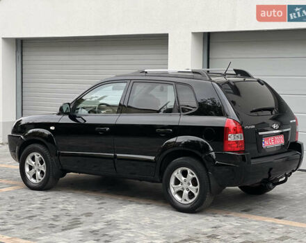 Чорний Хендай Туксон, об'ємом двигуна 2 л та пробігом 163 тис. км за 9199 $, фото 6 на Automoto.ua