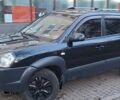 Черный Хендай Туксон, объемом двигателя 1.99 л и пробегом 240 тыс. км за 8700 $, фото 4 на Automoto.ua