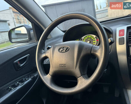 Хендай Туксон 2009 в Киеве на Automoto.ua Черный Хендай Туксон, объемом двигателя 2 л и пробегом 110 тыс. км за 8700 $, фото 32 на Automoto.ua