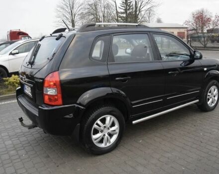Черный Хендай Туксон, объемом двигателя 2 л и пробегом 184 тыс. км за 5480 $, фото 9 на Automoto.ua