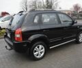 Черный Хендай Туксон, объемом двигателя 2 л и пробегом 184 тыс. км за 5480 $, фото 9 на Automoto.ua