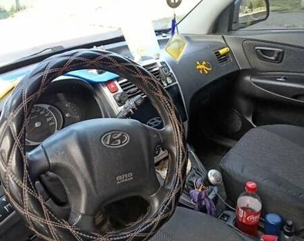 Черный Хендай Туксон, объемом двигателя 2 л и пробегом 226 тыс. км за 8700 $, фото 7 на Automoto.ua