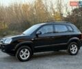 Черный Хендай Туксон, объемом двигателя 2 л и пробегом 110 тыс. км за 8899 $, фото 3 на Automoto.ua